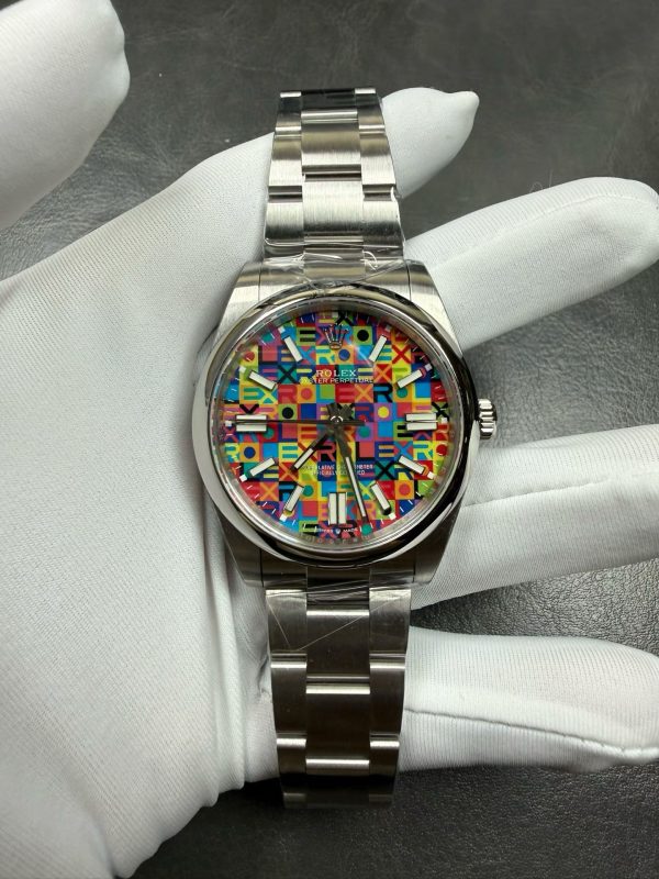 NOOB工場　新作ROLEX　オイスターパーペチュアル　41mm　マルチカラージュビリーモチーフ文字盤　オイスターブレスレット　3230ムーブメント　スーパーコピー